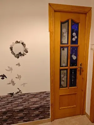 a door in a room with a wall at Habitación Manises Aeropuerto in Manises