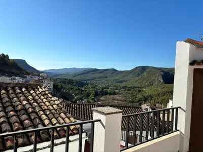 a view from the balcony of a house with mountains in the background at Casa Casidro in Chulilla