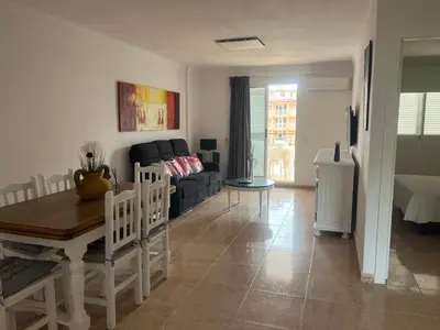 a living room with a couch and a table at Apartamento en Canet Berenguer Valencia in Canet de Berenguer