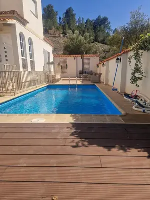 a swimming pool in the backyard of a house at Quesa Tranquil Valencia in Quesa