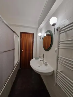 a bathroom with a sink and a mirror at 3 Bedroom Apartment with Balcony, Lift and AC in Every Room, 114 m2 in Nules