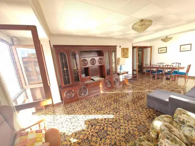 a living room with a couch and a table at 3 Bedroom Apartment with Balcony, Lift and AC in Every Room, 114 m2 in Nules