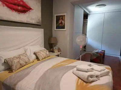 a bedroom with a bed with towels on it at Beautiful bedroom Country Villa with swimming pool in Lliria