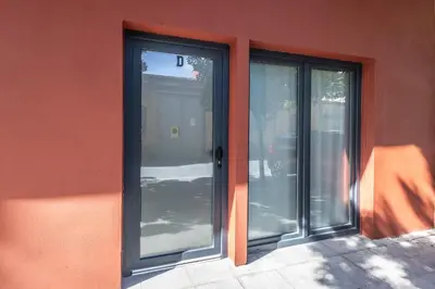 two glass doors on the side of a building at Rice Museum Apartments in Valencia