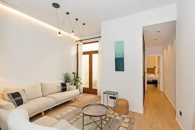 a living room with a couch and a table at Guestready - Bright stay at Cabanyal in Valencia