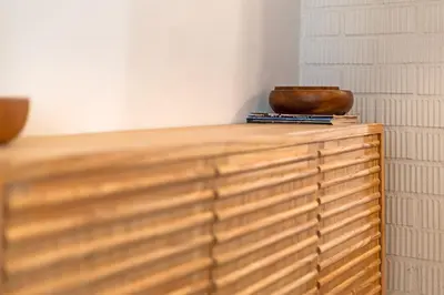 a wooden table with a bowl on top of it at Guestready - Bright stay at Cabanyal in Valencia
