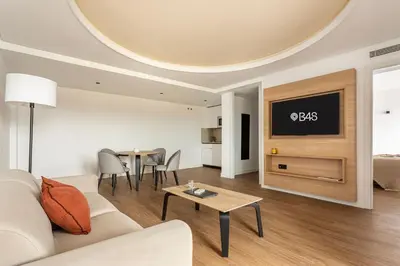 a living room with a couch and a table at B48 Valencia Feria in Valencia