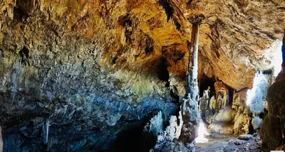 a cave with a waterfall inside of it at Estudio Finca Mas el Bravo in Caudiel