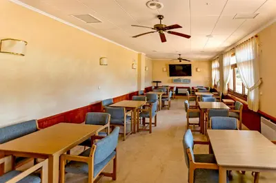 a row of tables and chairs in a restaurant at Florazar 2 Pool & Private Balcony in Cullera