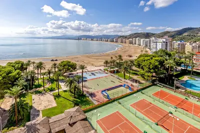 an aerial view of a beach with tennis courts at Florazar 2 Pool & Private Balcony in Cullera