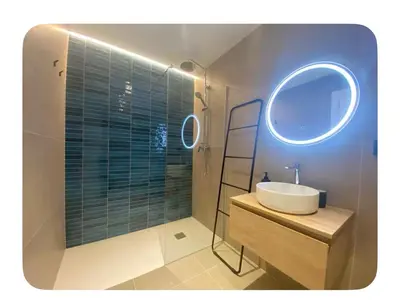 a bathroom with a sink and a mirror at Cosy apartment between beach and city centre in Valencia