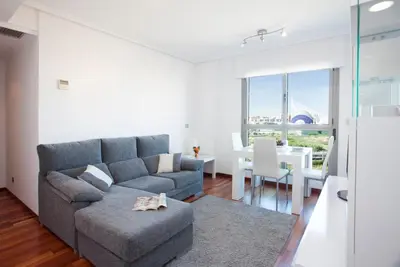a living room with a couch and a table at SingularStays Oceanic in Valencia