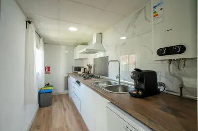 a kitchen with a sink and a counter top at ChillOut Area 2BR 4P City Relax Fast WiFi Pet Friendly in Valencia