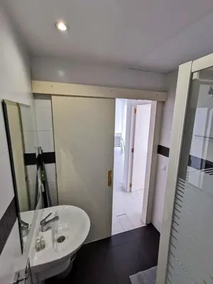 a bathroom with a sink and a mirror at Apartment Ruzafa Market 7C in Valencia