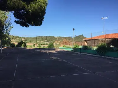 an empty parking lot with a building in the background at Ideal apartment in Náquera, Pool, Wifi in Náquera