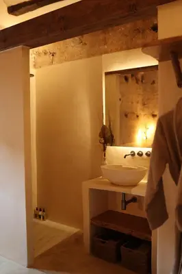 a bathroom with a sink and a mirror at Espacio Biocompatible - Villa Raíz in Requena