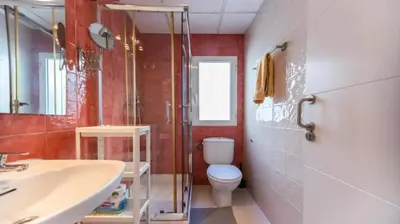 a bathroom with a toilet and a sink and a shower at Tu Estudio En El Centro-Ruzafa 10C in Valencia