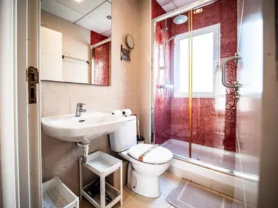 a bathroom with a toilet and a sink and a shower at Estudio En El Centro-Ruzafa 10D in Valencia