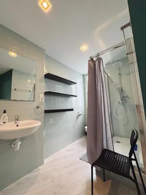 a bathroom with a shower and a sink at Tu Apartamento En El Centro - Ruzafa 8D in Valencia