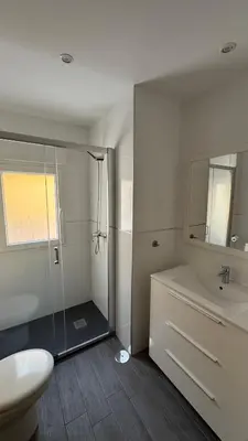 a bathroom with a shower and a sink and a toilet at Plaza la REINA 3th floor & no elevator in Valencia