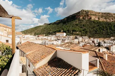 a view of a town with white buildings and a mountain at Brisas Chulilla Loft with Terrace in Chulilla