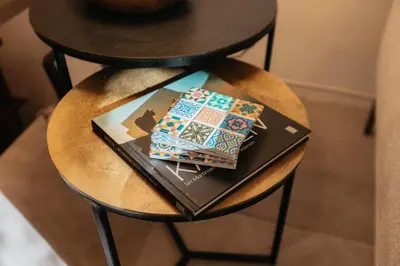 a table with a book and a pillow on it at Brisas Chulilla Mirador House in Chulilla