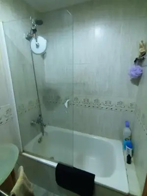 a bathroom with a shower with a tub and a sink at Habitación doble 45eur in Valencia