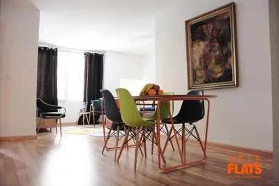 a dining room with a table and chairs at ART & FLATS Pleno Centro Valencia in Valencia