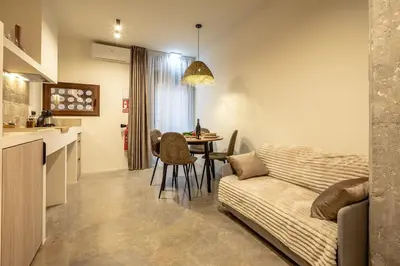 a living room with a couch and a table at Suite Ciudad de las Ciencias y Puerto - Manolito 4 in Valencia