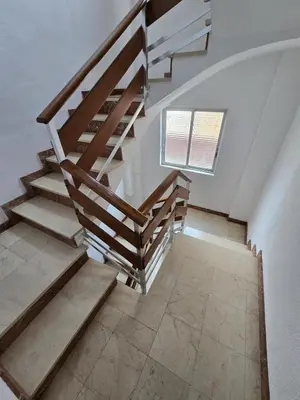 a staircase in a house with a window at Simat Malina in Simat de Valldigna