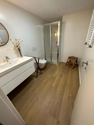 a bathroom with a toilet and a sink and a shower at 60m2 Cozy Apartament in Valencia