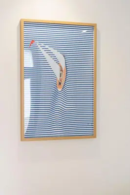 a picture of a pair of scissors on top of a blue garage door at Cabanyal Rooms by VLC Host in Valencia