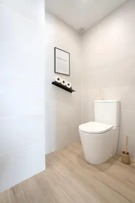a bedroom with a bed with two towels on it at Loft Valencia M11 - Ground & Arena Connected in Valencia