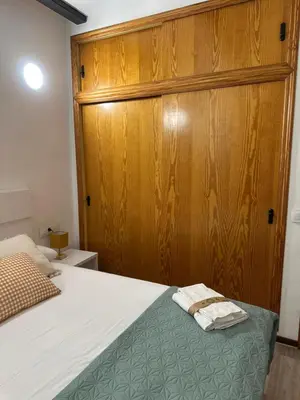 a bathroom with a toilet in a room at Peixcateria mini in Sagunto