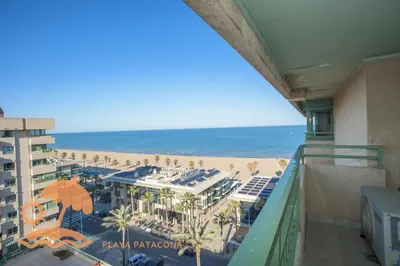 a view of the beach from the balcony of a resort at Holiday Mare Nostrum in Valencia