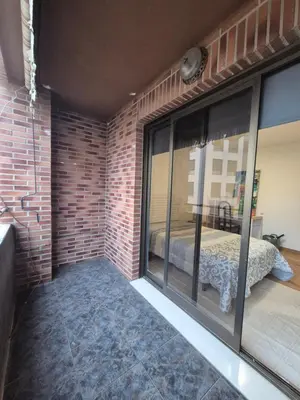 a metal pole in the corner of a room at Habitación doble Valencia in Alaquas