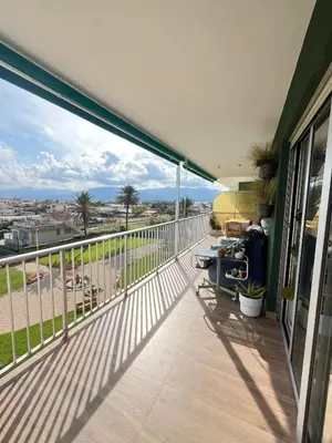 a balcony with a view of the ocean at Apartamento tranquilo y luminoso junto al mar in Cullera