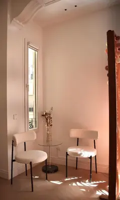 a room with two chairs and a table and a window at Stylish & Cozy Flat in heart of Eixample, Valencia in Valencia