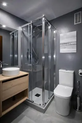 a bathroom with a shower and a toilet and a sink at Central Home Coliving - vive en la zona de moda del centro de Valencia in Valencia