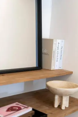 a wooden shelf with a bowl and a box on it at Studio 01 - Les Artes in Valencia