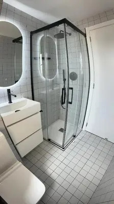 a bathroom with a shower and a sink at Triton in Mareny Blau