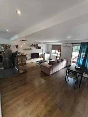 a living room with a couch and a table at Fabulous apartment in Valencia, Campanar in Valencia