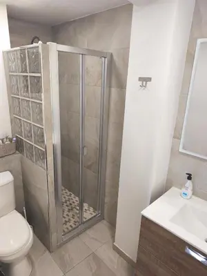 a shower in a bathroom with a toilet and a sink at Fabulous apartment in Valencia, Campanar in Valencia