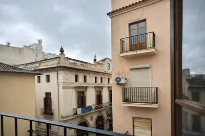 a view of a building from a window at Mini Peixcateria in Sagunto