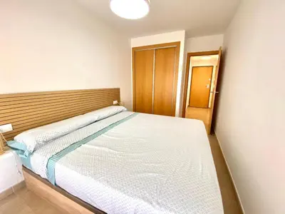 a bedroom with a large white bed in it at Dream Moncofar in Moncófar