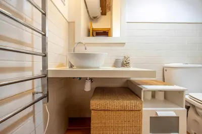 a bathroom with a sink and a toilet at Valencia Flat Rental 1 bedroom apartment historical center in Valencia