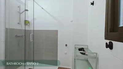 a bedroom with two yellow towels sitting on a bed at Guest Ready - Beachside Flat in Puerto de Sagunto in Puerto de Sagunto