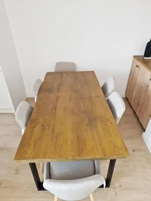 a conference room with a wooden table and chairs at Cabanyal playa las arenas apartamento reformado in Valencia