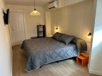 a bedroom with a bed and a window at Lorenzo in Benaguacil