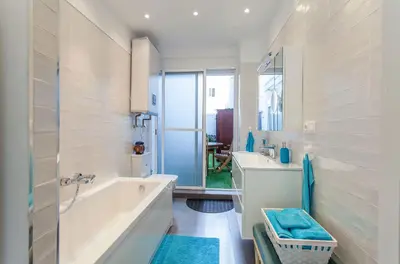 a bathroom with a tub and a sink at Apartment Ruzafa Zapadores in Valencia